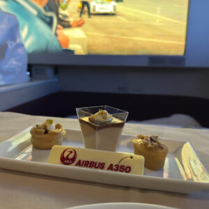 Apple cranberry tart, hazelnut mousse, and a hazelnut & orange semolina cake